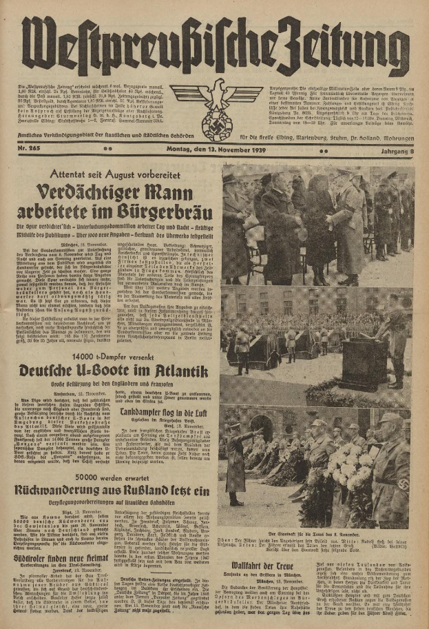 Schwarze Titelseite einer deutschen Zeitung vom 13. November 1939 mit der Überschrift 'Weitpreubliche Zeitung', die eine Gruppe von Menschen in traditioneller deutscher Tracht in einer feierlichen Umgebung zeigt.