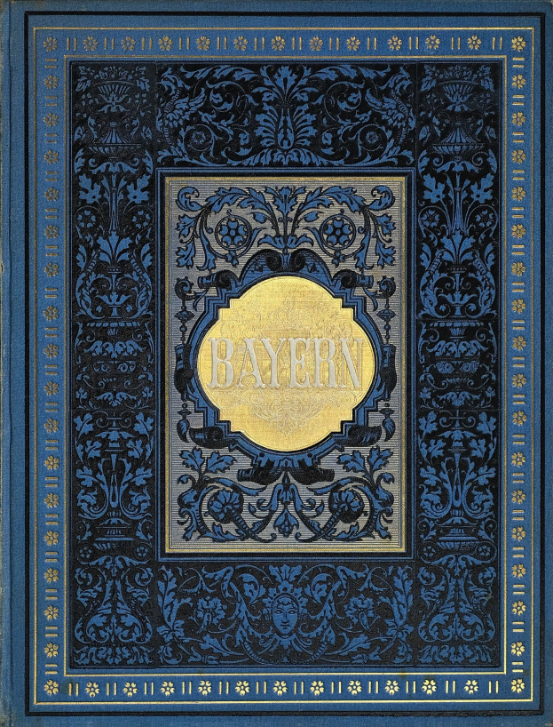 Ein blau-goldenes Buch mit dem Wort 'Bayern' auf dem Cover, das mit detaillierten Verzierungen geschmückt ist.